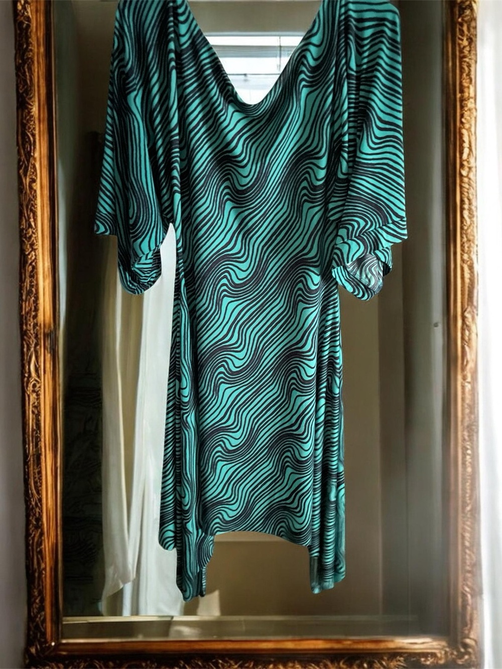 WhitneyMeri 
Asymmetrical Teal Wave-Print Dress Draped Sleeves 
Pit-Pit 18”
NWT